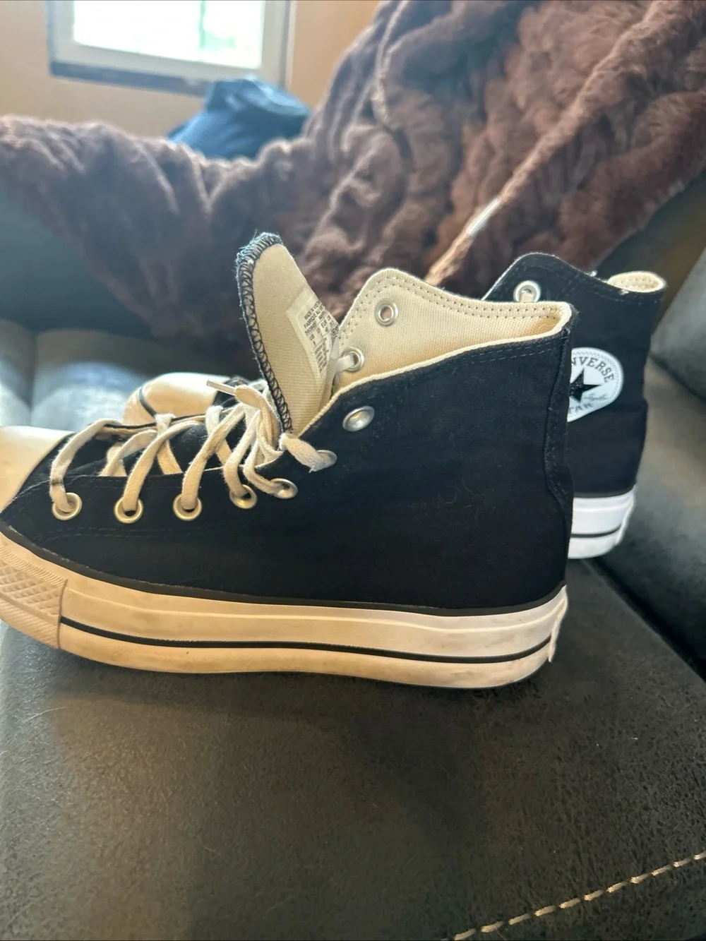 Women’s Converse Black and White High-Top Sneakers size 9